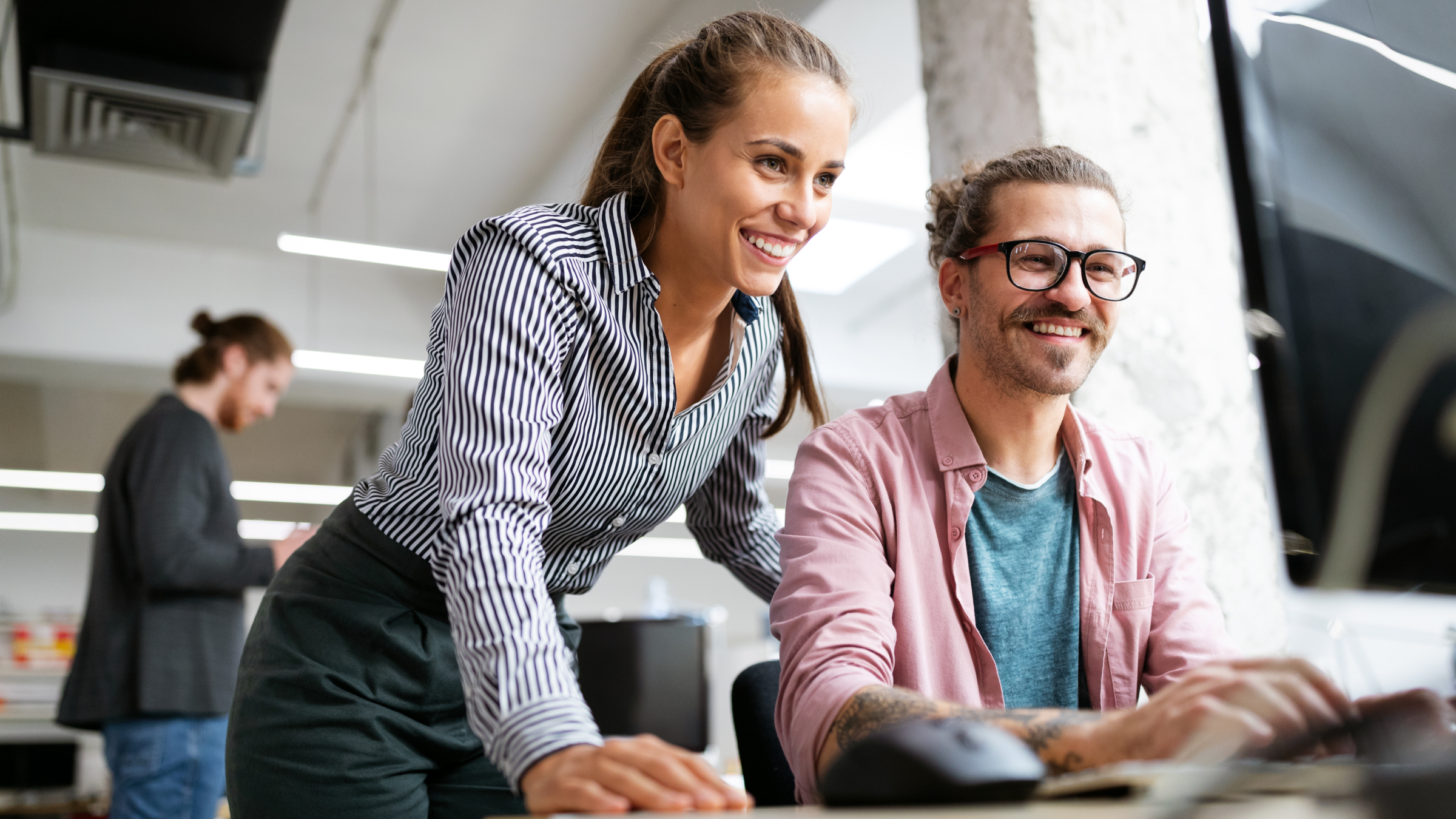 Two employees working together.